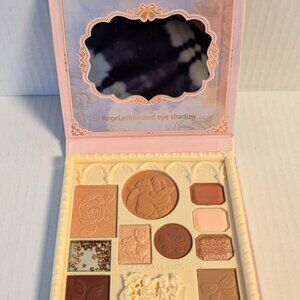 Four (4) Call Call Ling Angel Embossed Eyeshadow Palette. New But Expired.